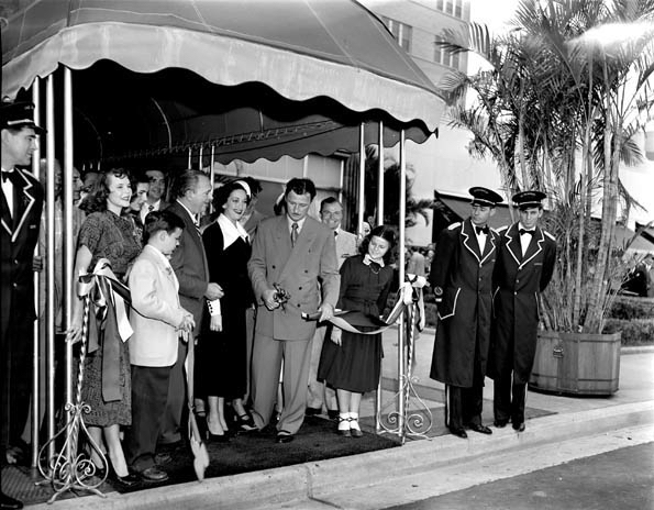MAIN Glenn McCarthy at the ribbon cutting opening of The Shamrock Hotel, 1949