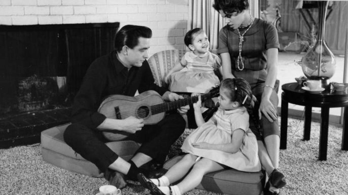 Vivian and Johnny Cash, with daughters at home, 1950s. Courtesy of Amazon Prime